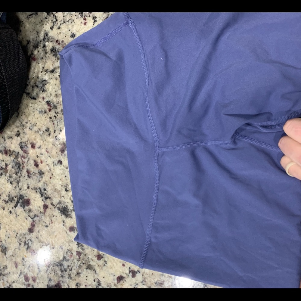 New without tags! Buttery soft material! They are a periwinkle blue  7/8 length.
